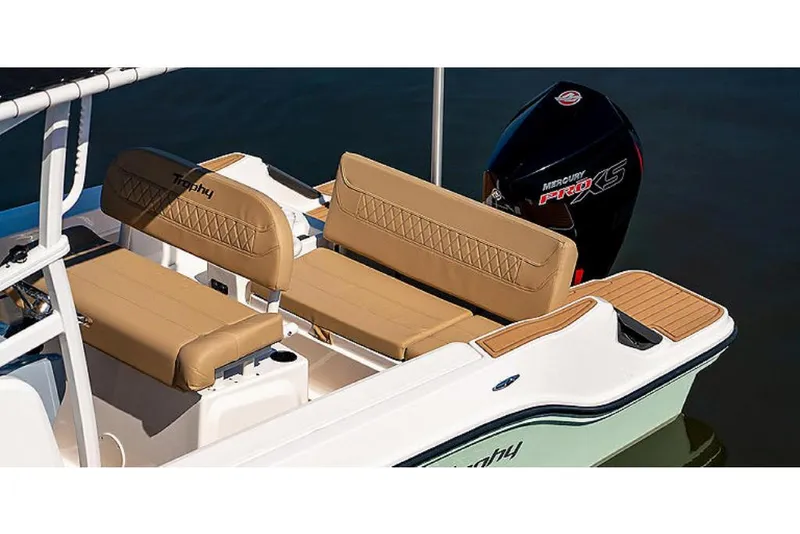 Slide: The Image of 2023 Bayliner T20 CX boat with tan seating and Mercury Pro XS outboard motor. - 6