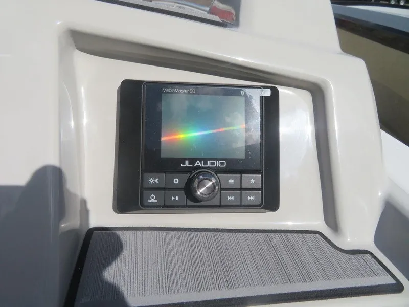 Slide: The Image of JL Audio system on 2023 Starcraft SVX 191 OB boat dashboard. - 13