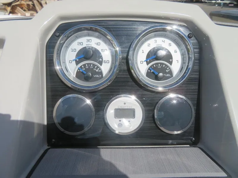 Slide: The Image of Dashboard of 2023 Starcraft SVX 191 OB boat with gauges and depth meter. - 9