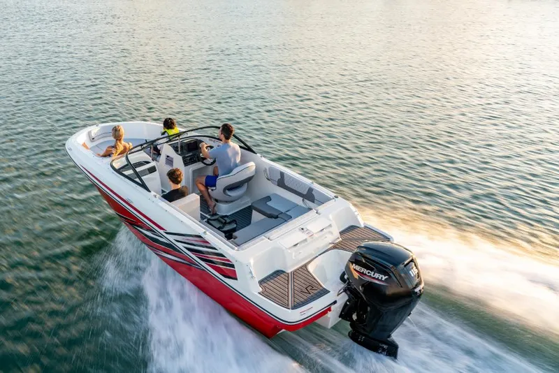 Slide: The Image of 2023 Bayliner VR4 Bowrider on water, rear view with passengers. - 3