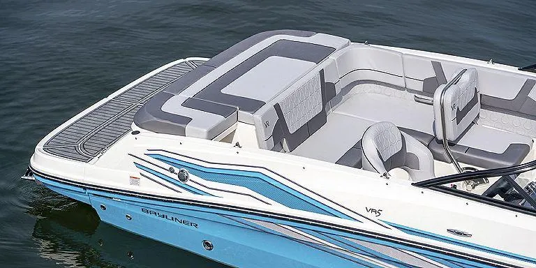 Slide: The Image of 2023 Bayliner VR5 Outboard boat with spacious seating on the water. - 2