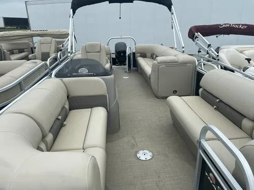 Slide: The Image of 2021 Sun Tracker Party Barge 22 DLX pontoon boat with beige seating and spacious layout. - 3