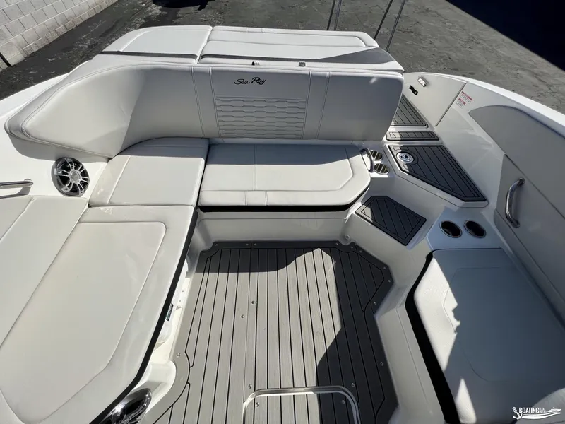 Slide: The Image of 2023 Sea Ray SPX 210 boat interior with sleek seating and modern design. - 8
