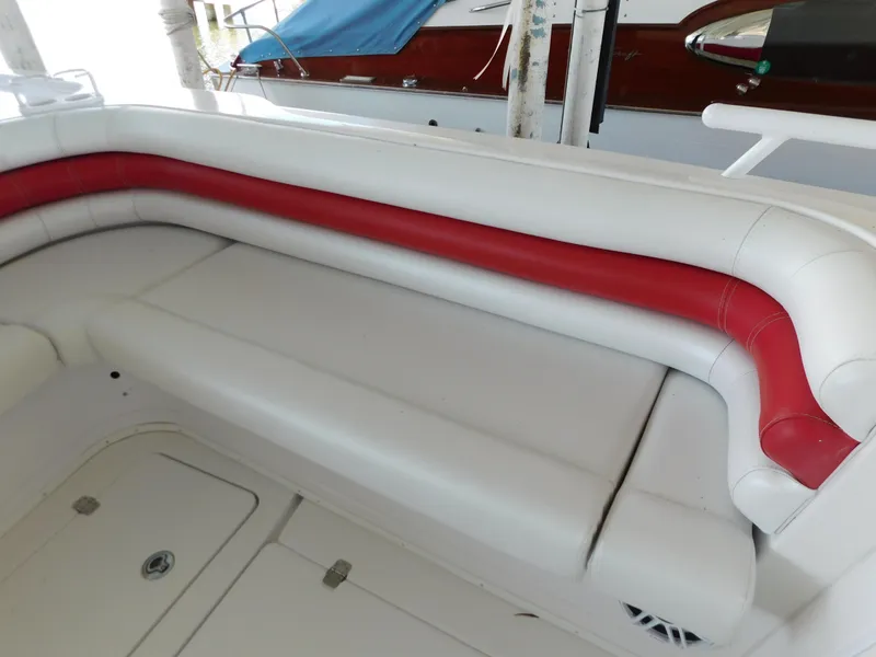 Slide: The Image of Interior of 2007 Donzi 38 ZFX boat with white and red upholstery. - 14