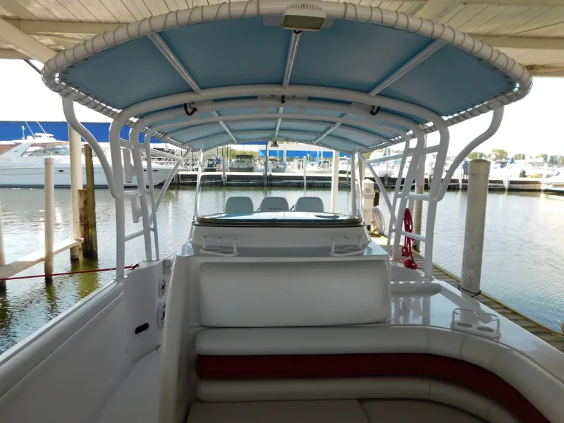 Slide: The Image of Interior view of a 2007 Donzi 38 ZFX boat in a marina. - 15