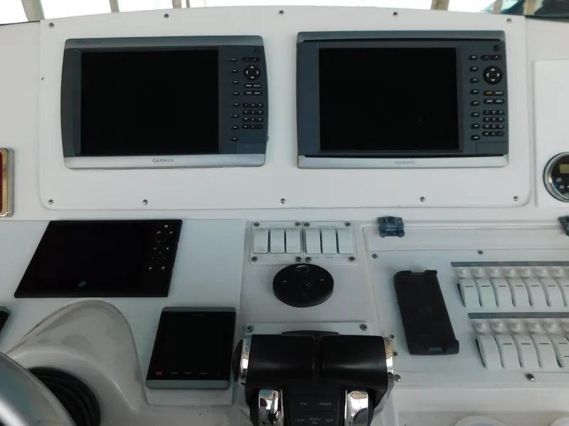 Slide: The Image of Dashboard of a 2007 Donzi 38 ZFX with Garmin screens. - 21
