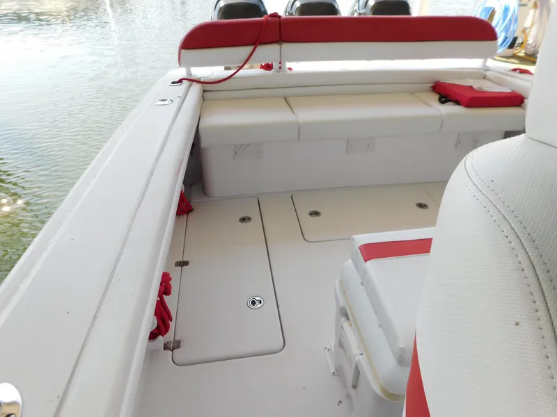 Slide: The Image of Interior of a 2007 Donzi 38 ZFX boat with red accents. - 24