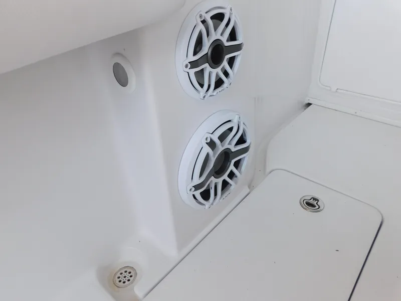 Slide: The Image of Speakers inside a 2007 Donzi 38 ZFX boat interior. - 27