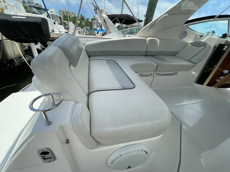 Slide: The Image of Interior of a 2011 Sea Ray Sundancer 280 with comfortable seating. - 14