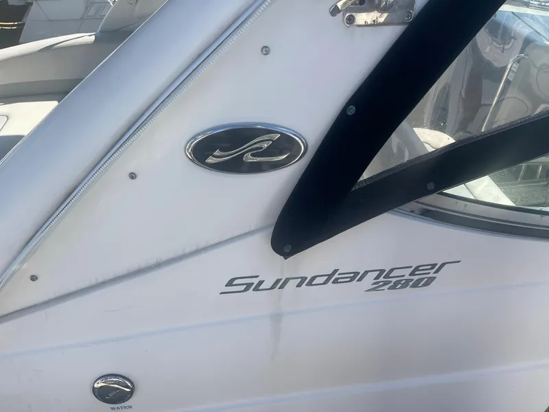 Slide: The Image of Sea Ray Sundancer 280 boat, 2011 model, close-up of logo. - 17