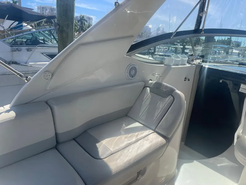 Slide: The Image of Interior of a 2011 Sea Ray Sundancer 280 yacht with seating area. - 29