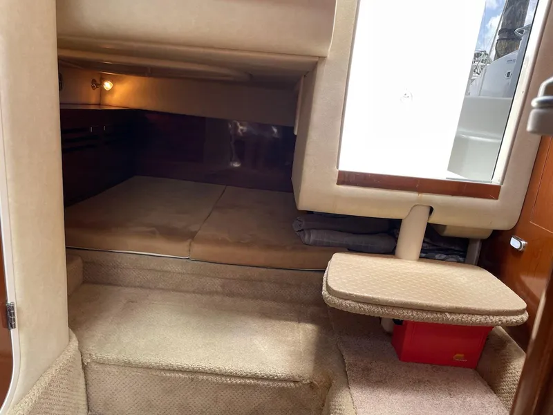 Slide: The Image of Interior of a 2011 Sea Ray Sundancer 280 yacht with sleeping area. - 40
