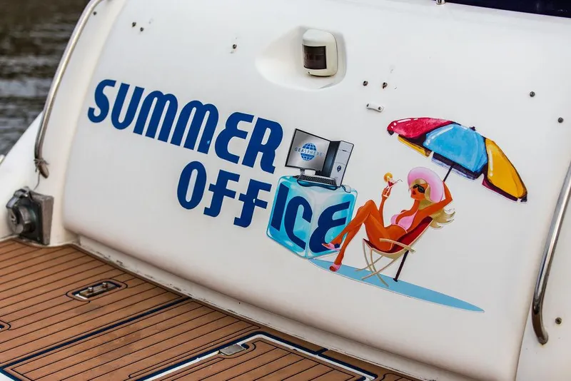 Slide: The Image of 1999 Sunseeker Carmargue yacht with Summer Office graphic and $250k in upgrades. - 12