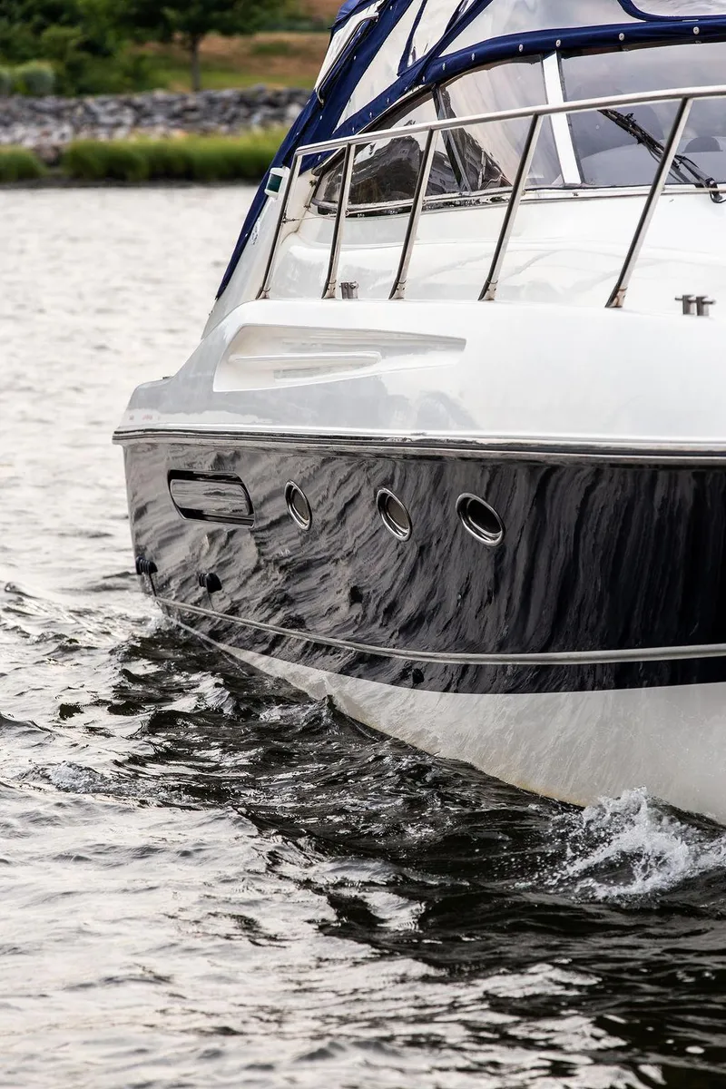 Slide: The Image of 1999 Sunseeker Camargue yacht with $250k in upgrades cruising on water. - 17