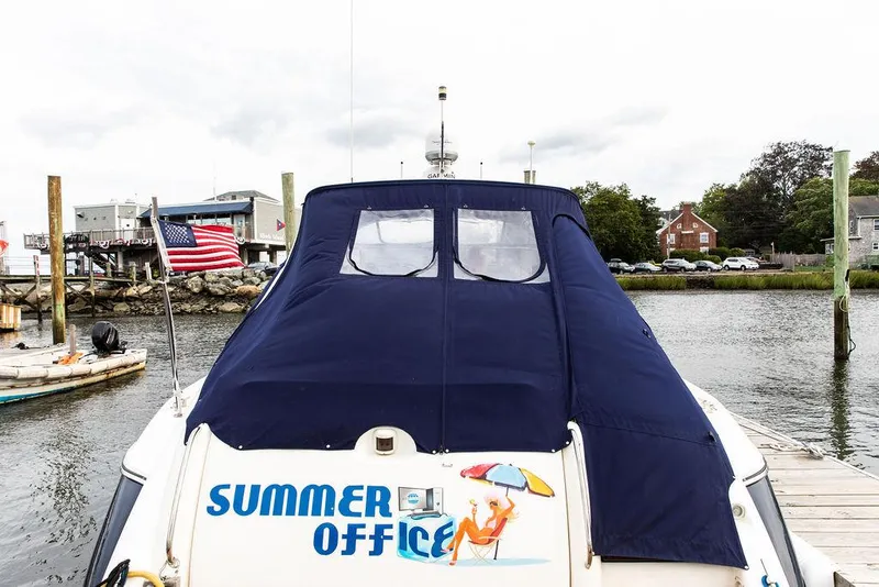 Slide: The Image of 1999 Sunseeker Carmargue yacht with $250k in upgrades, docked, named Summer Office. - 21