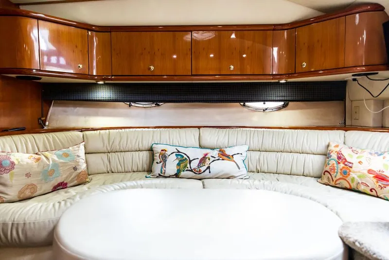 Slide: The Image of Luxurious interior of 1999 Sunseeker Camargue yacht with upgraded seating and cabinetry. - 25