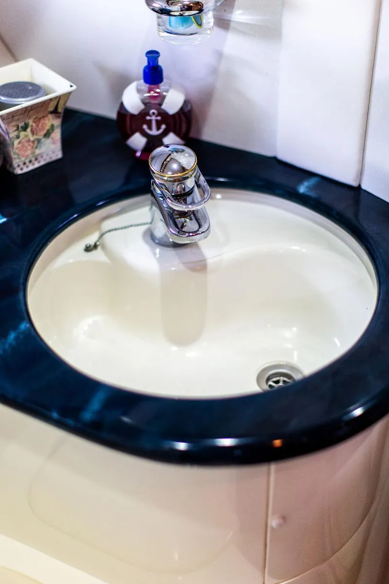 Slide: The Image of Sunseeker Camargue 1999 yacht bathroom sink with modern upgrades. - 28