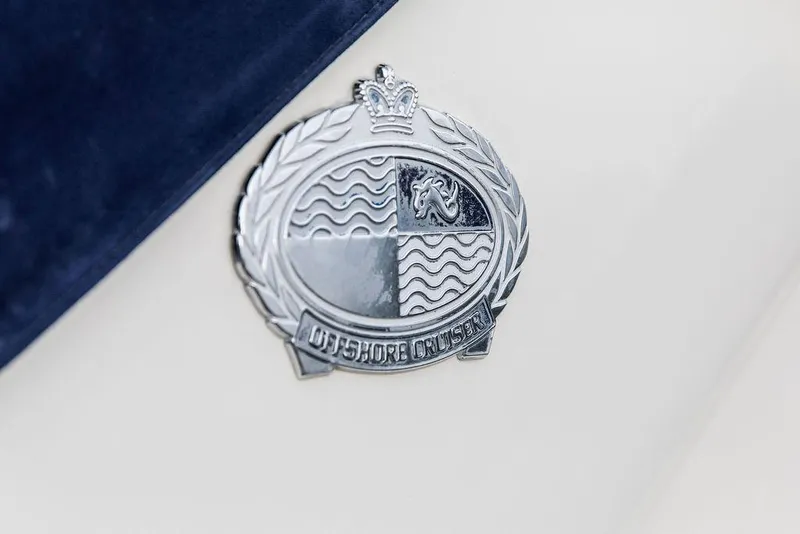 Slide: The Image of 1999 Sunseeker Carmargue emblem, $250k in upgrades, luxury yacht badge. - 7