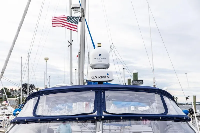 Slide: The Image of 1999 Sunseeker Camargue yacht with $250k in upgrades, featuring Garmin navigation. - 8