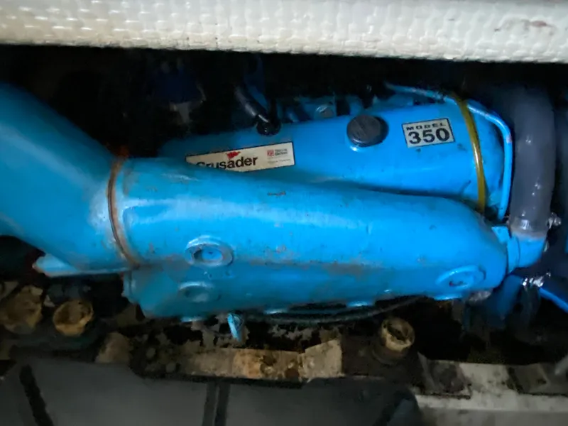 Slide: The Image of 1984 Trojan 10 Meter Sedan Crusader 350 engine in blue. - 38