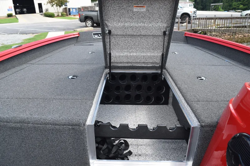 Slide: The Image of 2022 Polar Kraft Bass TX 195 Pro boat with open storage compartment. - 13