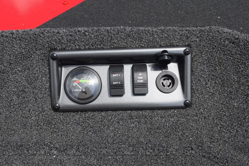 Slide: The Image of Control panel of 2022 Polar Kraft Bass TX 195 Pro boat with voltmeter and switches. - 15