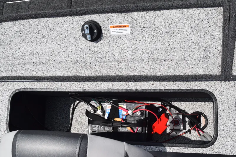 Slide: The Image of 2022 Polar Kraft Bass TX 195 Pro boat battery compartment. - 18