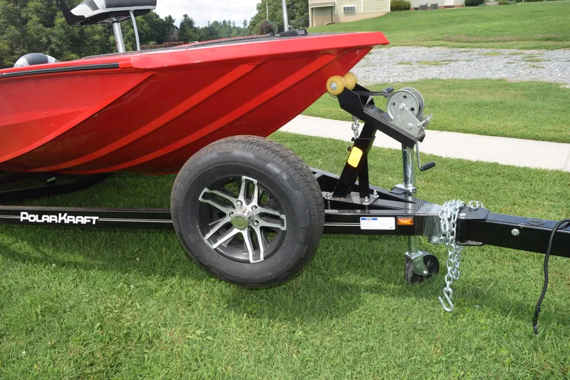 Slide: The Image of 2022 Polar Kraft Bass TX 195 Pro boat on trailer with spare tire. - 6