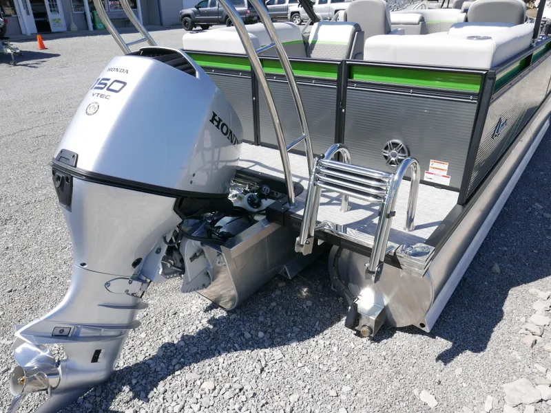 Slide: The Image of 2023 Qwest E-Class 822 RLS LTZ pontoon boat with Honda 150 outboard motor. - 4