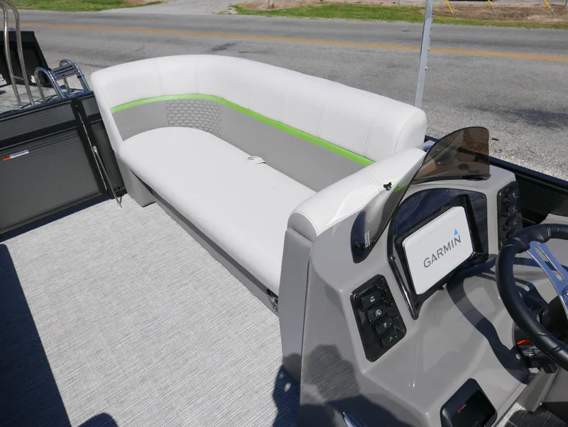 Slide: The Image of 2023 Qwest E-Class 822 RLS LTZ boat interior with Garmin navigation system. - 6