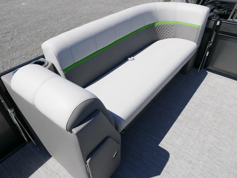 Slide: The Image of 2023 Qwest E-Class 822 RLS LTZ boat seating with gray upholstery and green accent. - 7