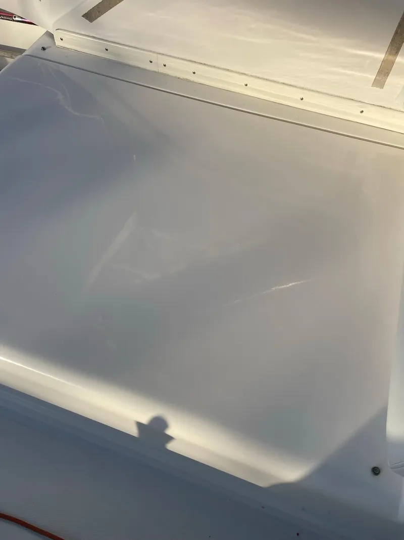 Slide: The Image of 1995 Blackfin 29-2 Combi boat deck, smooth white surface. - 14