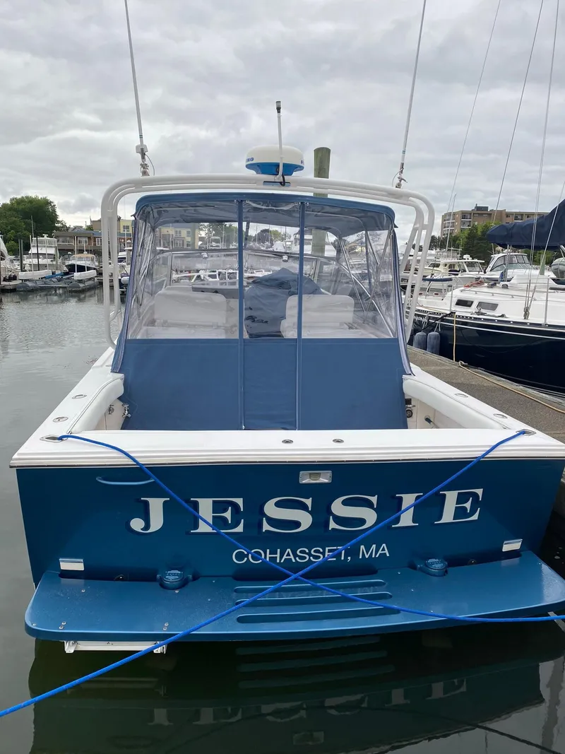 Slide: The Image of 1995 Blackfin 29-2 Combi boat named "Jessie" docked in Cohasset, MA. - 2