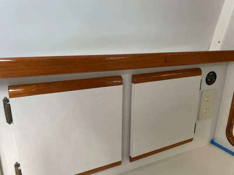 Slide: The Image of Interior of 1995 Blackfin 29-2 Combi boat with wooden trim and cabinets. - 23