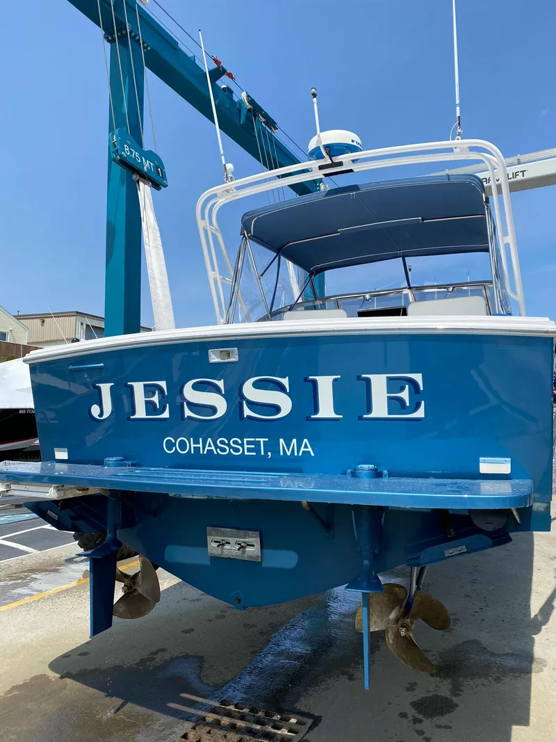 Slide: The Image of 1995 Blackfin 29-2 Combi boat named "Jessie" in Cohasset, MA, on a lift. - 7