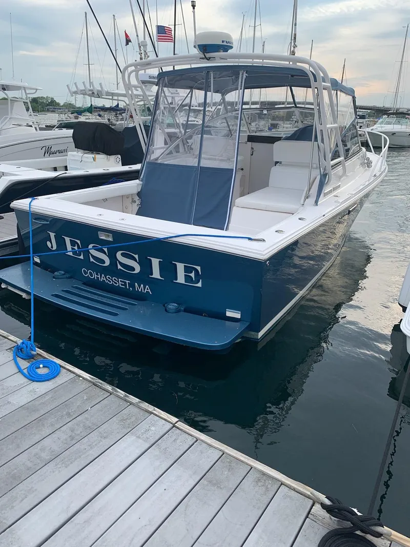 The Image of 1995 Blackfin 29-2 Combi boat docked, named "Jessie," in Cohasset, MA marina. - 0