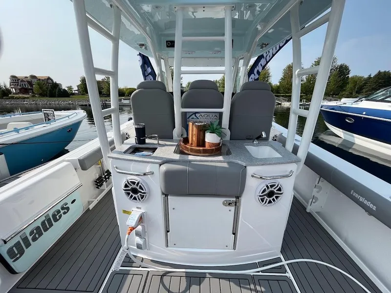 Slide: The Image of 2023 Everglades 365 CC boat interior with seating and amenities. - 5