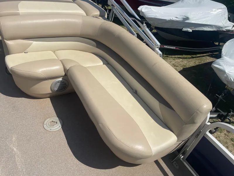Slide: The Image of 2016 Sun Tracker Fishin' Barge 22 DLX beige seating area on deck. - 10