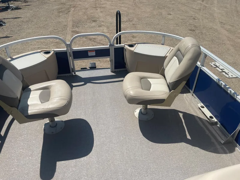 Slide: The Image of 2016 Sun Tracker Fishin' Barge 22 DLX with two swivel seats on deck. - 12