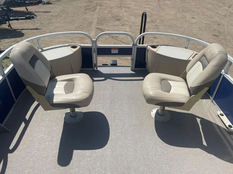 Slide: The Image of 2016 Sun Tracker Fishin' Barge 22 DLX with two fishing seats on deck. - 13