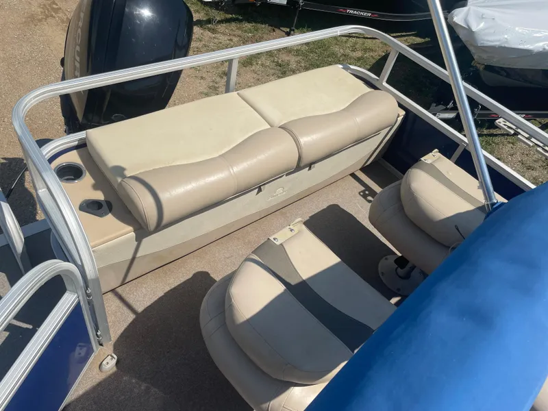 Slide: The Image of 2016 Sun Tracker Fishin' Barge 22 DLX interior seating and fishing area. - 8