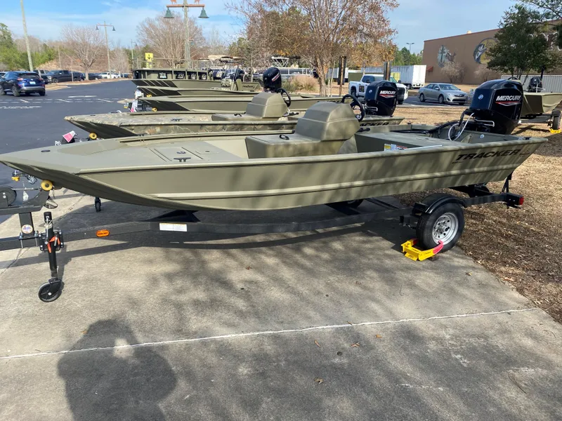 The Image of 2023 Tracker Grizzly 1648 SC boat on trailer in outdoor lot. - 0