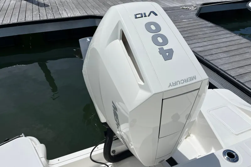 Slide: The Image of 2024 Boston Whaler 280 Dauntless with Mercury 400 V10 engine at dock. - 4
