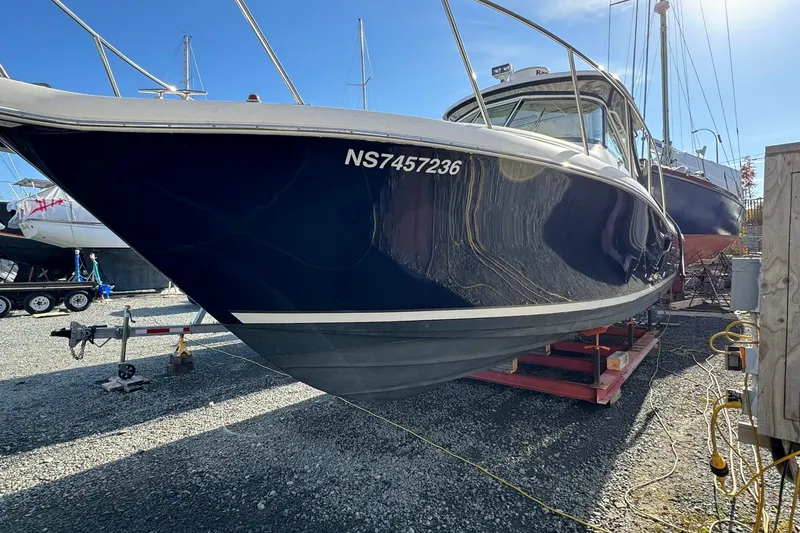 Slide: The Image of Pursuit 3100 Offshore 2004 - 45