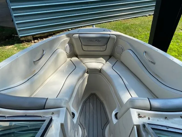 Slide: The Image of 2010 Sea Ray 230 Select boat interior with white seating and gray accents. - 14
