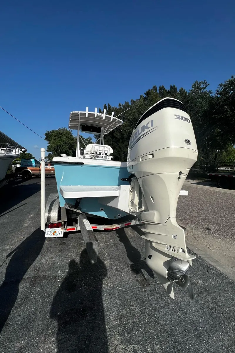 Slide: The Image of 1988 Hydra-Sports 2500 CC boat with Suzuki 300 outboard motor on trailer. - 12