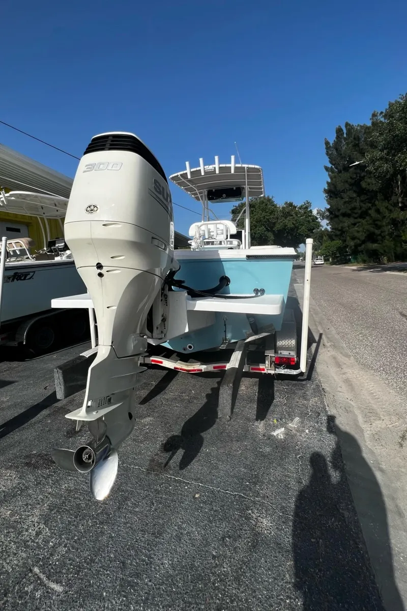 Slide: The Image of 1988 Hydra-Sports 2500 CC boat with outboard motor on a trailer. - 19