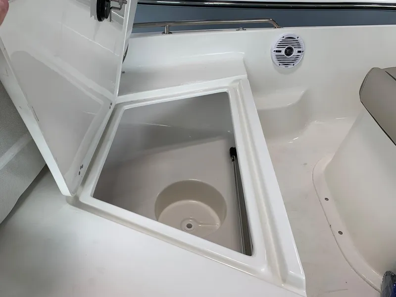 Slide: The Image of Open storage compartment on a 2024 Key West 1720 Sportsman boat. - 4