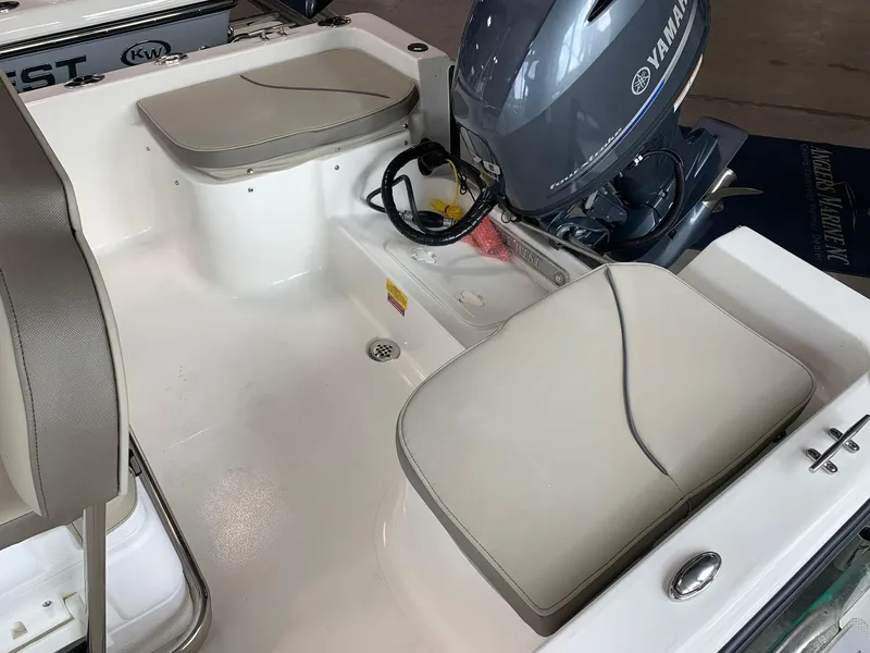 Slide: The Image of 2024 Key West 1720 Sportsman boat interior with Yamaha outboard motor. - 7