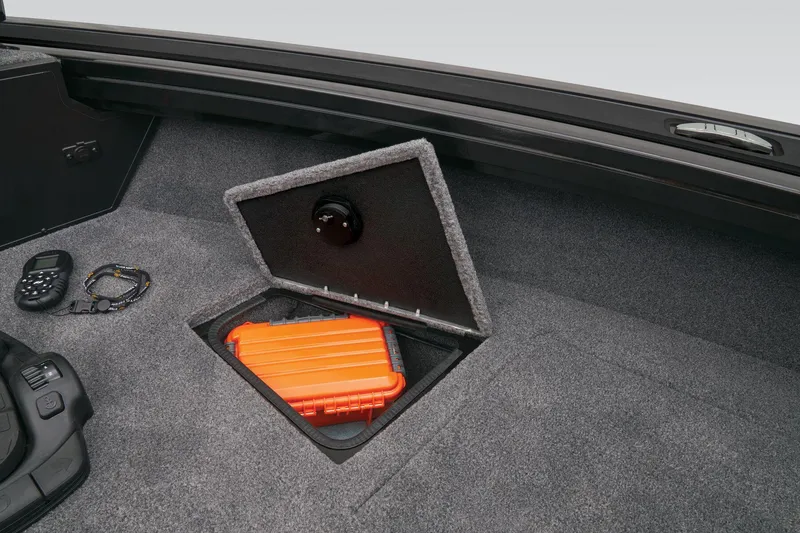 Slide: The Image of 2023 Tracker Targa V-19 WT storage compartment with orange case. - 24
